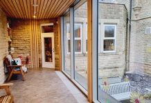 Charity thanks aluminium fabrication and installation specialist for its support as work completes on its new activity wing